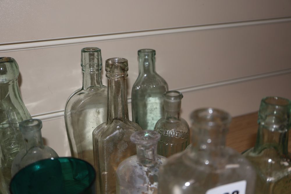 A quantity of glasses and glass bottles